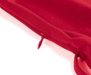 Detail of red vintage dress showing high-quality matching invisible zipper and fabric texture
