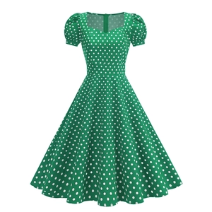 Retro green polka dot A-line dress featuring sweetheart neckline and puff sleeves
