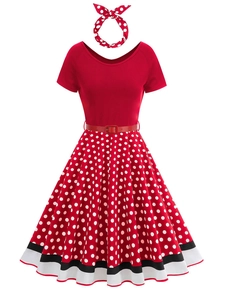 Close-up of vintage 1950s V-neck polka dot dress set with red belt and headband