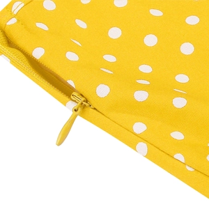 Nahaufnahme eines hochwertigen unsichtbaren Reißverschlusses am gelben Polka-Dot-Kleid
