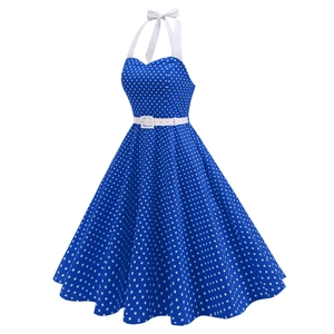 Detail view of royal blue polka dot retro dress with halter neck and white waist belt