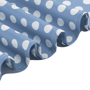 Detailed view of the light blue polka dot fabric and high-quality hem stitching