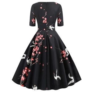 Vintage V-neck dress with oriental floral and crane prints on black fabric