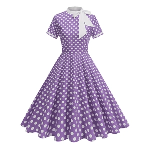 Vintage purple polka dot A-line dress with white bow collar and full swing skirt