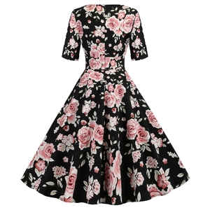 Vintage short sleeve V-neck dress featuring pink rose floral print and a flared swing skirt