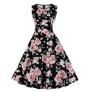 Vintage 1950s style sleeveless floral A-line cocktail dress with pink rose patterns