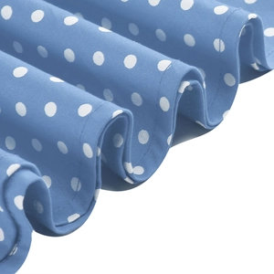 Macro shot of light blue polka dot dress fabric with premium stitching and retro pleats
