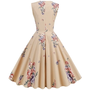 Rear view of vintage floral sleeveless dress with A-line skirt on white background
