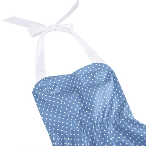 Detail of blue polka dot halter dress with wide white neck ties and sweetheart neckline