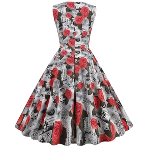 Detail view of vintage Audrey Hepburn style A-line dress with red rose floral pattern