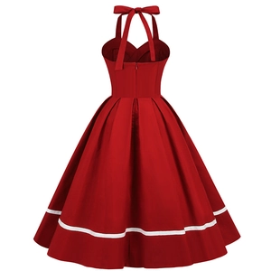 Back view of a red 1950s vintage halter dress with white stripe and bow tie detail