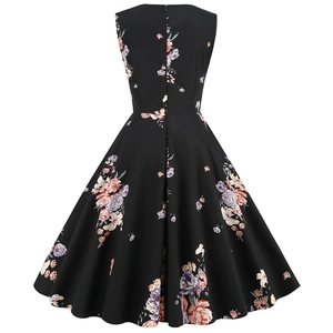 Close-up of the back zipper and retro floral print on a black sleeveless A-line dress