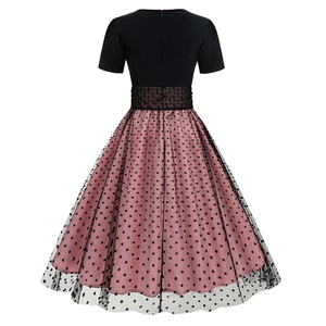 Detailed back view of vintage Hepburn dress with polka dot mesh and invisible zipper