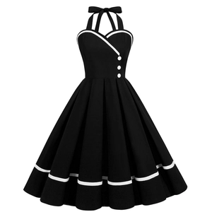 Vintage 50s black and white halter neck dress with heart-shaped bodice and flared skirt