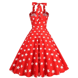 Vintage red halter dress with white stars and a large back bow, 50s Hepburn style