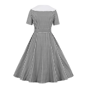Detail view showing the large white sailor collar and back of the black gingham dress