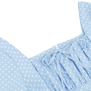 Vintage light blue polka dot dress featuring a retro square neckline and bow detail