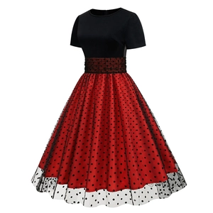 Detail of retro polka dot mesh waist and flared A-line skirt on vintage dress