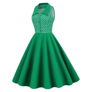 Vintage green sleeveless polka dot dress with lapel collar and flared A-line skirt