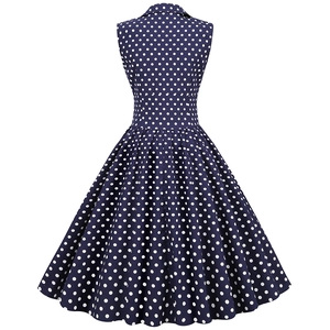 Vintage navy blue polka dot sleeveless dress with lapel and full flared skirt, back view