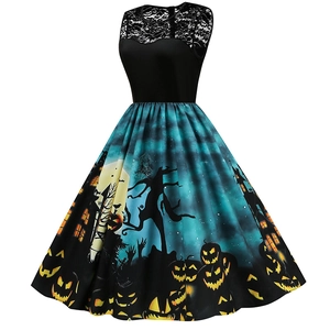 Detail of Halloween dress featuring black lace bodice and high-waisted pumpkin print skirt