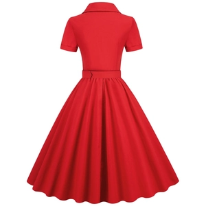 Back view of a red vintage A-line dress with short sleeves and a matching wide belt