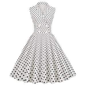 Vintage Audrey Hepburn style sleeveless polka dot dress with lapel collar and buttons