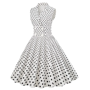 Retro polka dot sleeveless lapel dress with double-breasted design and pleated skirt