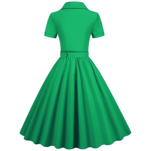 Detail view of back profile on vintage green short-sleeve dress with matching waist belt