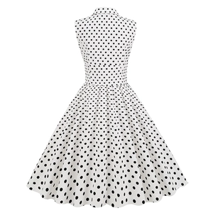 Detail view of Hepburn style sleeveless polka dot dress with vintage lapel and A-line waist