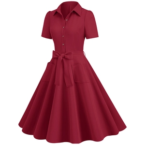 Detail of vintage burgundy A-line dress featuring a lapel collar and waist bow tie