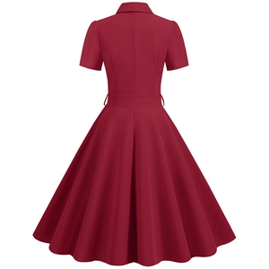 Rear view of vintage burgundy short-sleeve dress with belted waist and full A-line skirt