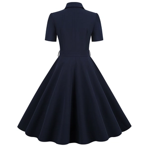 Retro dark blue short sleeve A-line swing dress with waist belt shown from back view