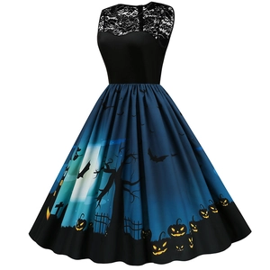 Detail of lace bodice and Halloween pumpkin castle print on the vintage A-line dress