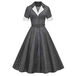 Detail of vintage plaid dress with white contrast lapel collar and matching waist belt