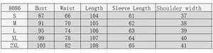 Detailed size guide table for women's black and white vintage dress from S to 2XL