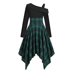 Detail of a black long-sleeve dress with green plaid asymmetric handkerchief hemline