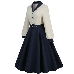 Detail of V-neckline and waist belt on a retro colorblock long-sleeved dress