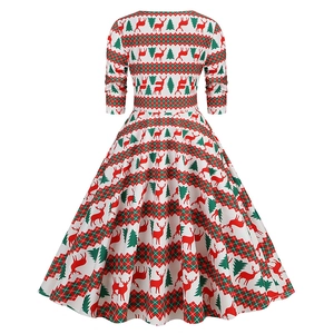 Back view of a Christmas vintage dress with festive deer and pine tree prints