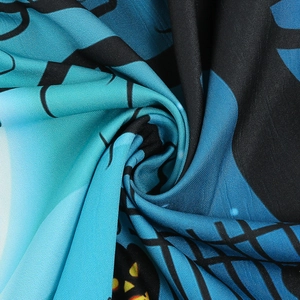 Detailed macro view of Halloween printed fabric with lace patchwork and pumpkin pattern
