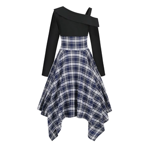 Detail of the asymmetrical off-shoulder neckline and blue plaid irregular hemline
