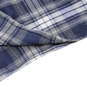 Detail shot of the blue and white plaid fabric showing high-quality stitching and texture
