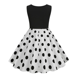 Vintage sleeveless round neck girl dress with black top and white polka dot skirt
