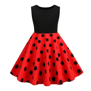 Girls vintage sleeveless round neck dress with black bodice and red polka dot skirt