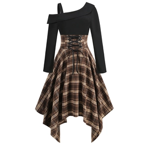 Close-up of vintage irregular dress with plaid skirt and high-waisted lace-up detail