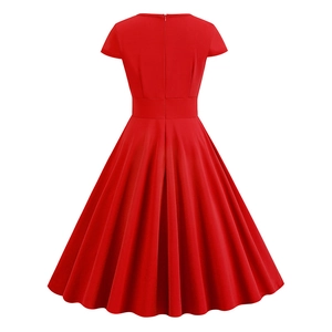 Detailed back view of a red V-neck vintage dress with pleated A-line skirt and zipper