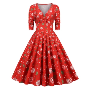Vintage red Christmas dress with V-neck, snowflake print and flared A-line silhouette