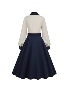 Vintage two-tone black and white long sleeve dress in 50s retro A-line silhouette, back view