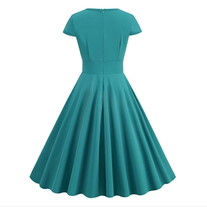 Rear view of vintage emerald green A-line dress with wide waistband and back zipper