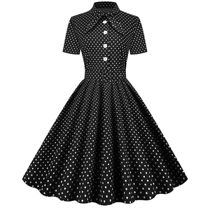 Retro black and white polka dot short sleeve dress with bow collar and flared A-line skirt